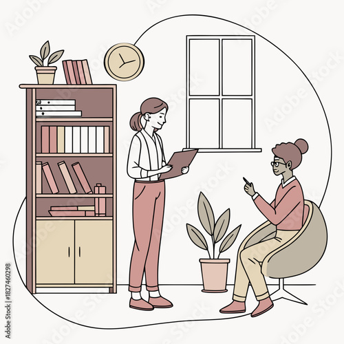 Two women in a room one standing with a clipboard and the other sitting in a chair discussing something