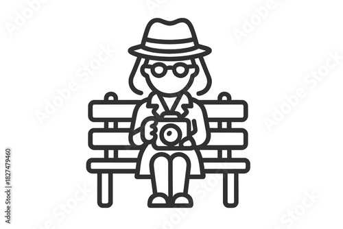 Secret agent sitting on a park bench holding a camera for covert surveillance and investigation