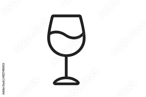 Classic stemmed wine glass filled with liquid ready for drinking or tasting
