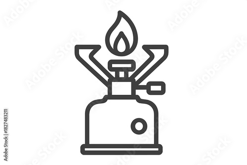 Portable camping stove with a flame used for heating food during outdoor activities