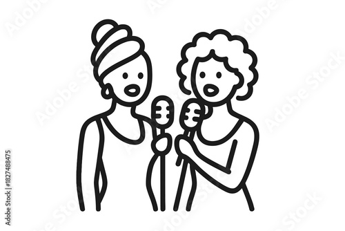 Two women singing duet into microphones performing live music on stage