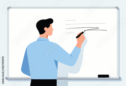 A man in a light blue shirt writes on a whiteboard with a black marker, back to viewer