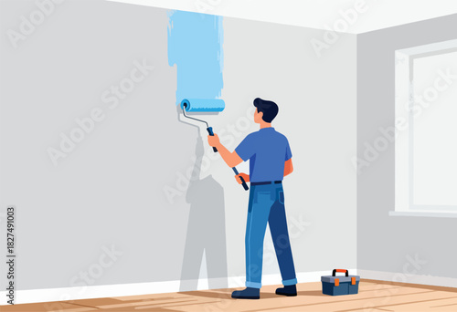 A person paints a wall blue using a roller. The room has a window and a toolbox sits on the floor
