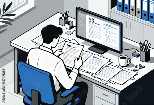 An HR person reviews documents, surrounded by paperwork and a computer screen, at their desk