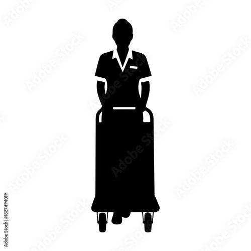 Silhouette of a person pushing a cart with wheels in a black and white image