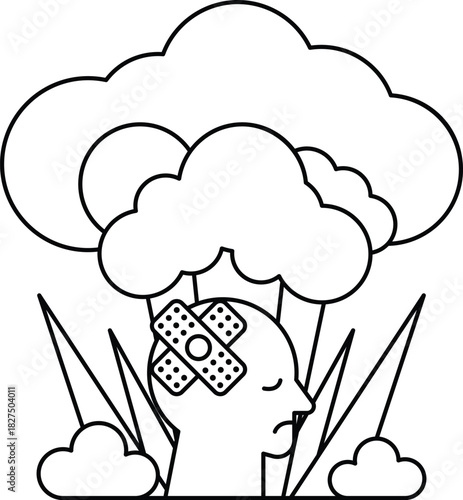 A man with a bandaged head is lying in a field of grass