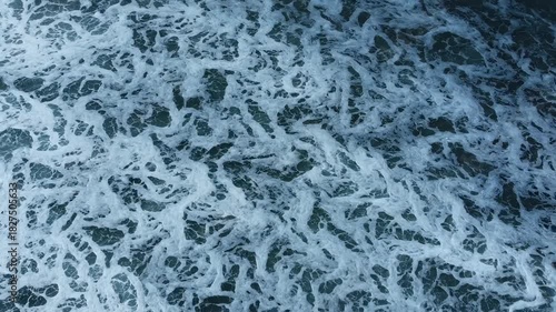 Abstract blue water surface background with a cold frozen ice texture and crystal pattern design