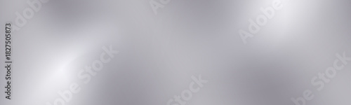 Polished silver mirror gradient surface with glow. Soft metallic reflections form an elegant silver gradient background.
