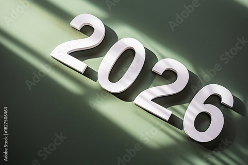 white number of New Year 2026 on green background, with soft window light and the swaying leaves shadow. backdrop for Happy New Year 2026 greeting background theme, celebration, invitation and festive