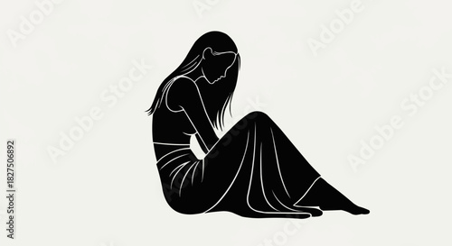 Silhouette of a woman sitting alone in a moment of contemplation.