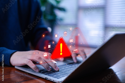 Cyber ​​attack alert on laptop. Cyber ​​attack on computer network. Virus, spyware, malware or malicious software. Businessman background.