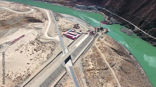 Large-Scale Viaduct Bridge Construction Over Turquoise River - Engineering Project