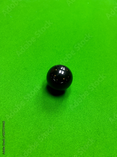 Obraz na plátně A high-angle, close-up photograph of the green baize of a snooker table