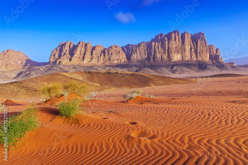 Wadi Rum Desert, Jordan. The red desert and Jabal Al Qattar mountain.