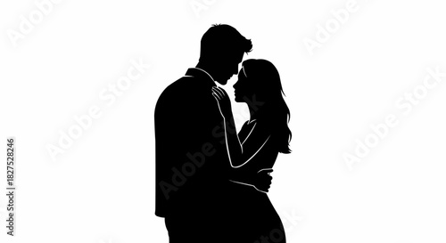 Silhouette of a loving couple embracing closely.