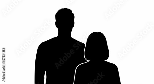 Silhouette of a man and a woman standing together.