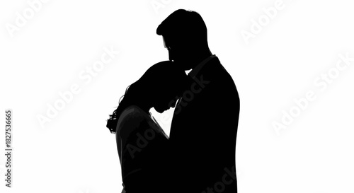 Silhouette of a Couple Embracing in a Tender Moment.