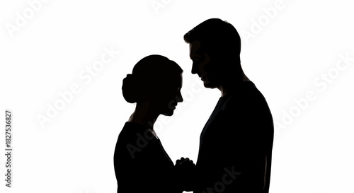 Silhouette of a couple in a tender embrace, showing love and connection.