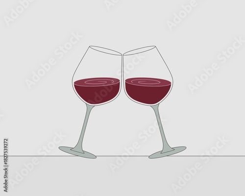 Two elegant wine glasses clinking together above a simple surface, symbolizing celebration, friendship, and joy, capturing the essence of shared moments over a drink.