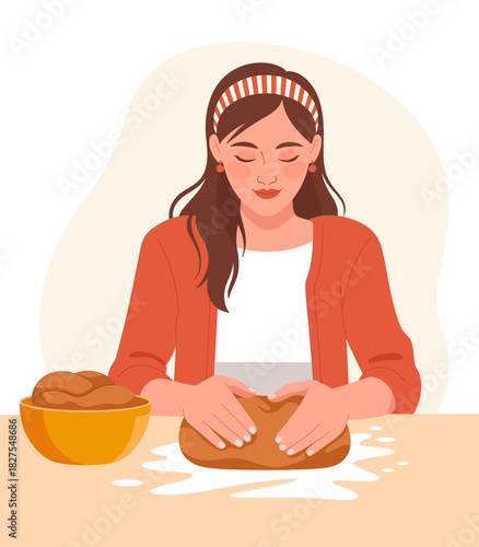 A woman happily kneads dough at a kitchen table, embodying the warmth of home cooking, the art of baking, and the joy of creating delicious treats from scratch.