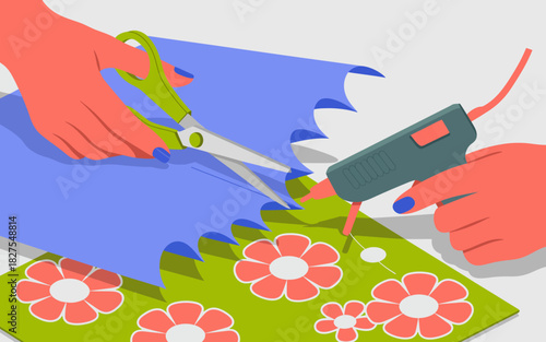 A hands-on crafting scene featuring brightly colored scissors and a hot glue gun, showcasing the creative process of making floral decorations with paper.