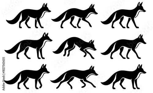 Fox silhouettes in calm walking poses. Clean lines show high quality. The set reflects light movement and natural animal behavior