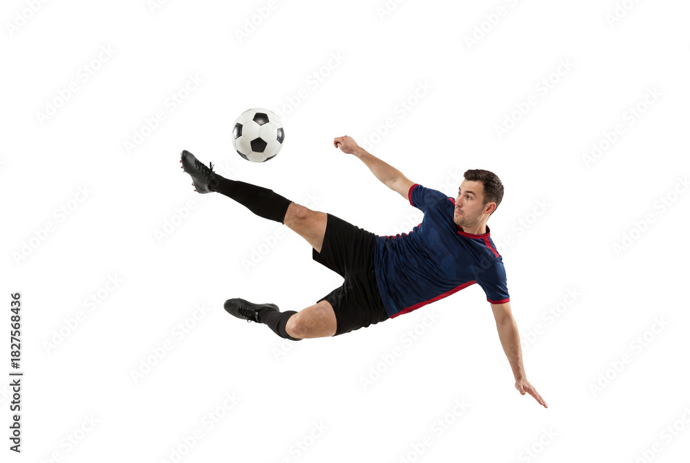 Fototapeta premium Male soccer player performing flying kick with focus on ball in mid air, action sports concept for competition training, athletic skill and dynamic movement isolated on transparent background