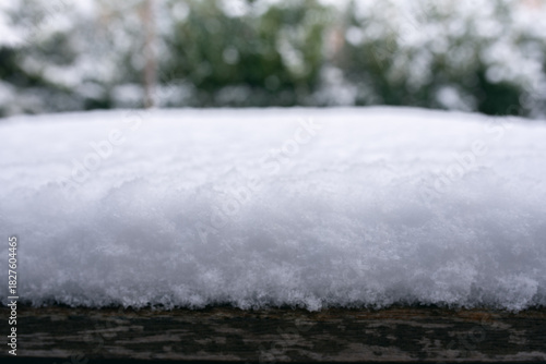 tabletop under a layer of snow in winter