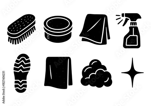 Silhouette cleaning supplies set with brush, cloth, and spray bottle icons