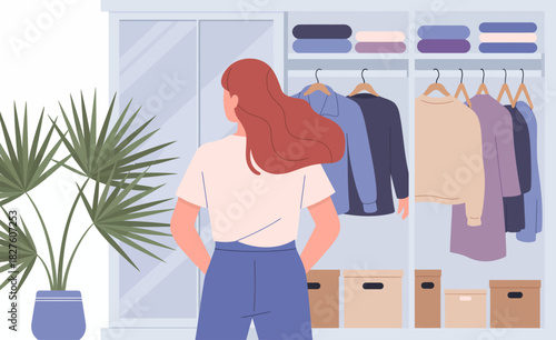 A woman standing in front of a well-organized wardrobe filled with clothing, conveying themes of fashion, choice, and everyday life, inviting viewers to relate and reflect.
