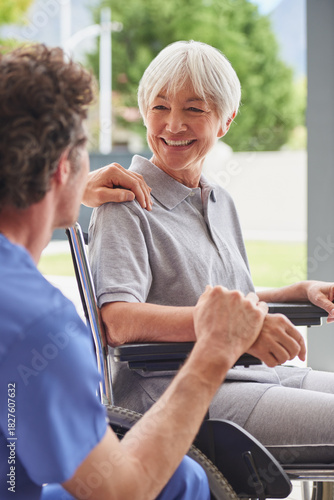 Nurse, elderly woman and wheelchair with empathy, senior care and wellness for health in nursing home. Pensioner, person with a disability and help with caregiver in recovery at rehabilitation clinic