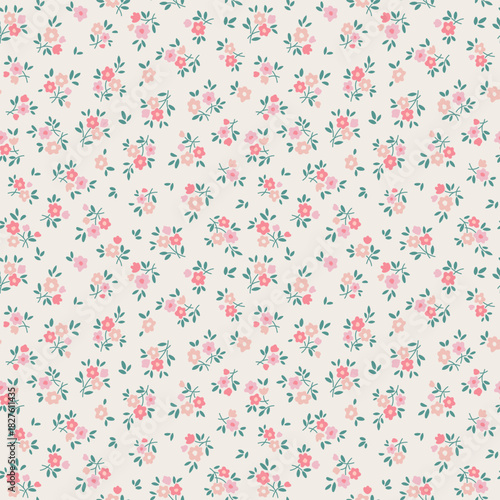 Beautiful floral pattern in small flowers. Small pastel pink, coral and red flowers. Ecru background. Ditsy print. Floral seamless background. Liberty template for fashion prints. Stock flowers art