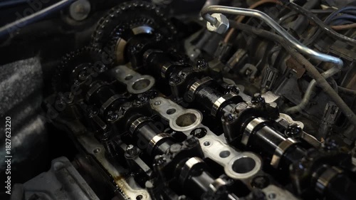 Close-up of car engine timing chain and camshafts