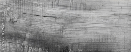Close-up of a naturally weathered wooden surface featuring subtle grain shifts, light cracks and organic patterns. Ideal for backgrounds, material design, rustic themes and nature textures.
