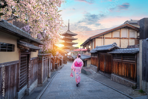 Sticker Yasaka Pagoda in Kyoto, Japan, in spring, cherry blossoms in full bloom and Japanese girls in beautiful kimonos