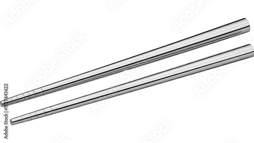 A pair of metal chopsticks angled diagonally against a dark background with a subtle reflective sheen