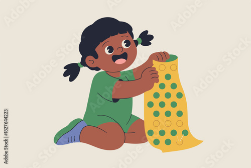 A cartoon child sits cross-legged, excitedly holding up a yellow, perforated sheet of paper