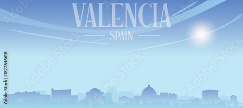 Blue panoramic poster of the city skyline with misty background buildings and clouds of VALENCIA, SPAIN