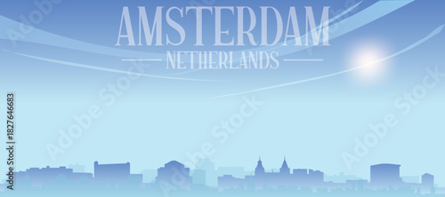 Blue panoramic poster of the city skyline with misty background buildings and clouds of AMSTERDAM, NETHERLANDS