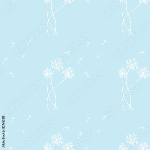 Seamless pattern with dandelions on a blue background.