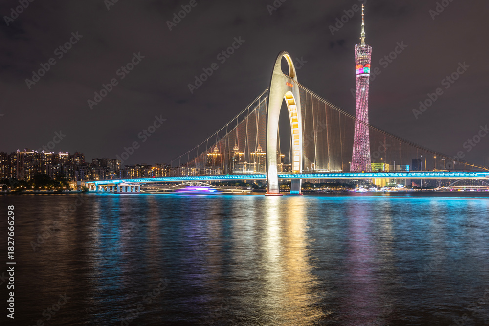 Obraz premium Night view of Guangzhou Tower and Liede Bridge, landmark buildings in Guangzhou, China