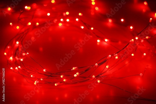 Red string lights creating festive bokeh background
