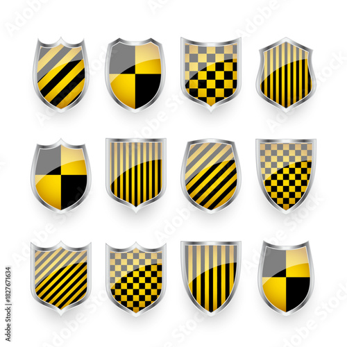 Glossy shields with yellow and black pattern. Security and protection concept. Cyber safety icons, internet privacy, web defense, digital data protection and antivirus themes. Vector illustration