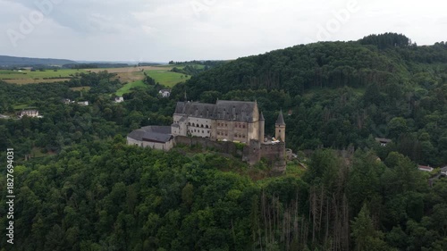 Wallpaper Mural Aerial Drone View of Vianden Castle: Famous Feudal Fortress and Historic Monument on a Hilltop in Luxembourg. Torontodigital.ca