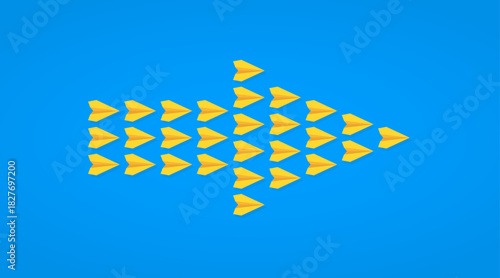 Multiple yellow paper planes forming an arrow shape, symbolizing collective effort, direction, and forward movement.