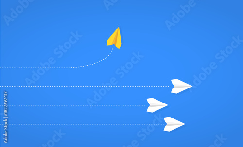 Yellow paper plane taking a different path while white planes follow, symbolizing thinking differently, changing paths, and embracing new directions