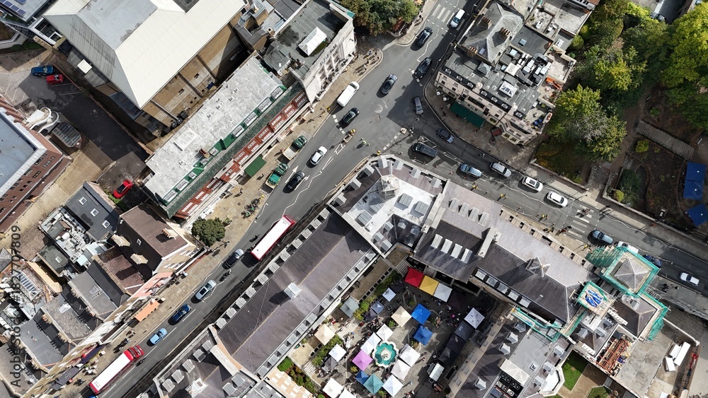 Fototapeta premium Overhead birds eye aerial view Colourful Outdoor Market Stalls and high street Richmond Town Centre UK