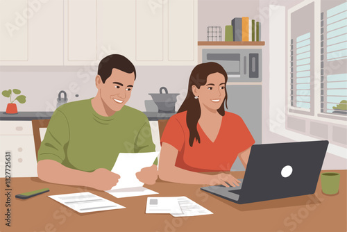 A couple works at a table in a kitchen, one with papers, the other with a laptop. Kitchen appliances are in the background