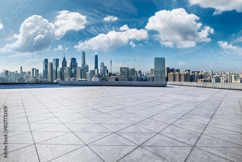 Empty square floor and city skyline with modern buildings in Guangzhou