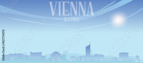 Blue panoramic poster of the city skyline with misty background buildings and clouds of VIENNA, AUSTRIA